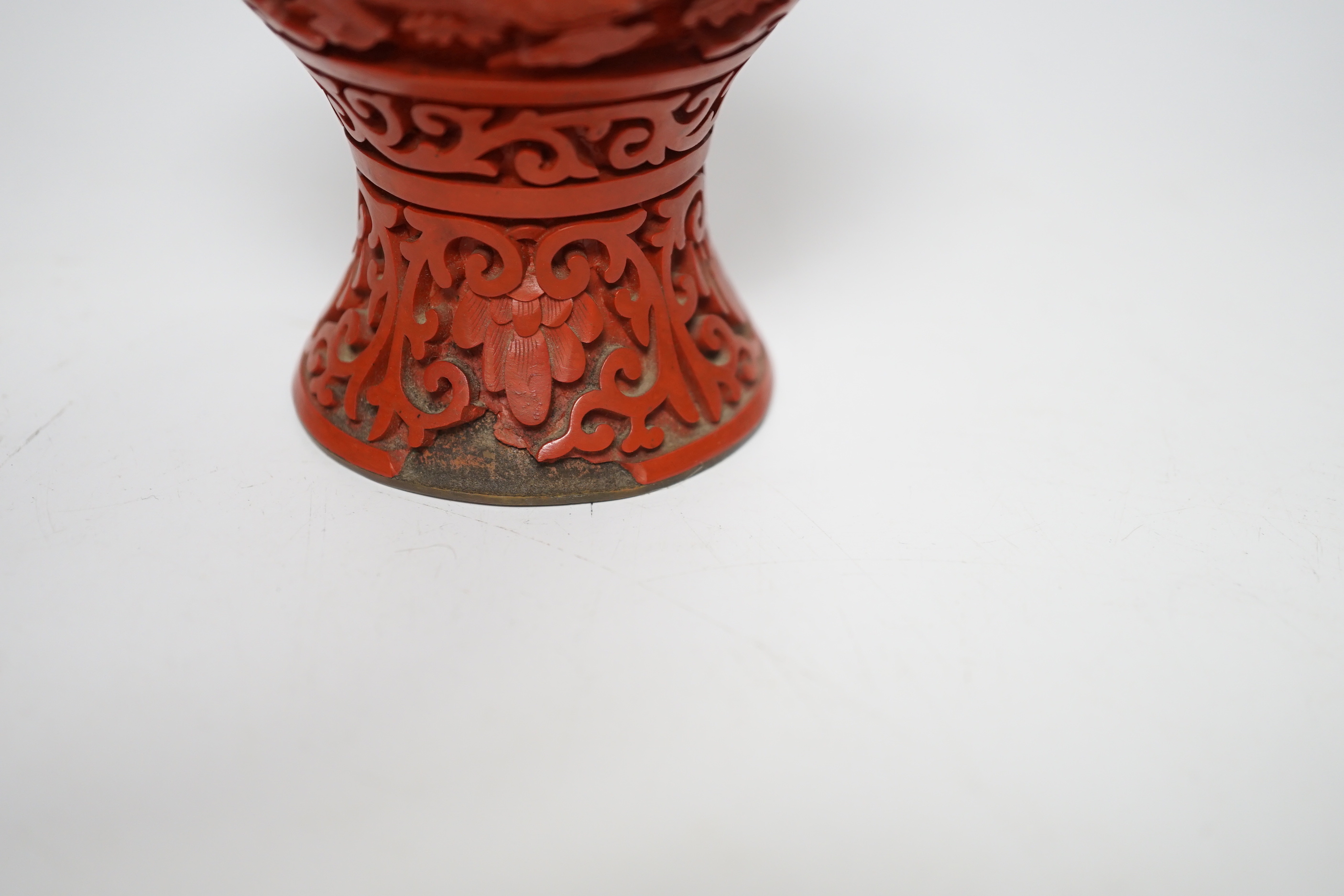 Three Chinese cinnabar lacquer items, a vase, an ashtray and a lidded box, vase 16.5cm